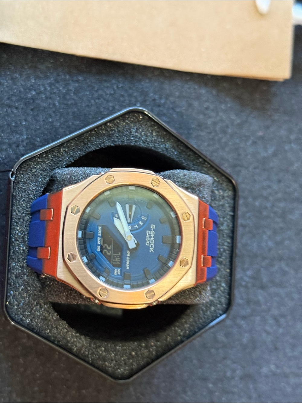 G-Shock Blue and Red Men’s Watch with Rose Gold Bezel